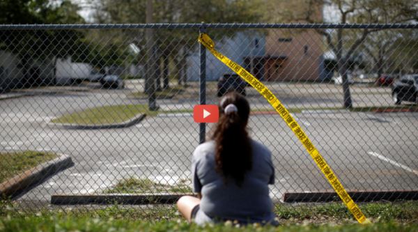 Woman mourns at Marjory Stoneman Douglas High School_video