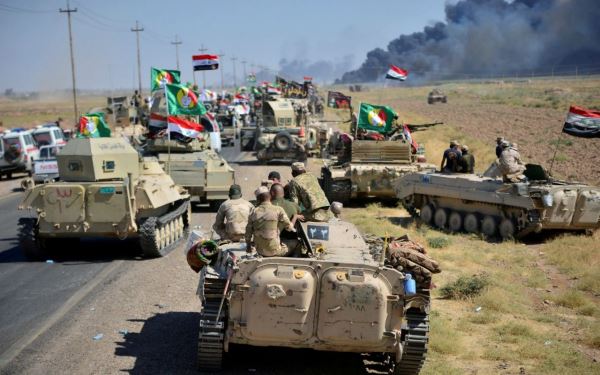 PopularMobilisationForces (PMF)andIraqi-army-members-gather-on-the outskirts-of Hawija,Iraq